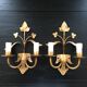 Pair of gold metal wall lights