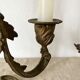 Pair of antique bronze candlesticks at the end of the table XIXth