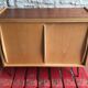 Vintage storage cabinet sliding doors feet compass