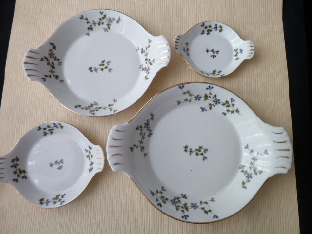 Set of 4 porcelain dishes with fire L. Lourioux de Foecy