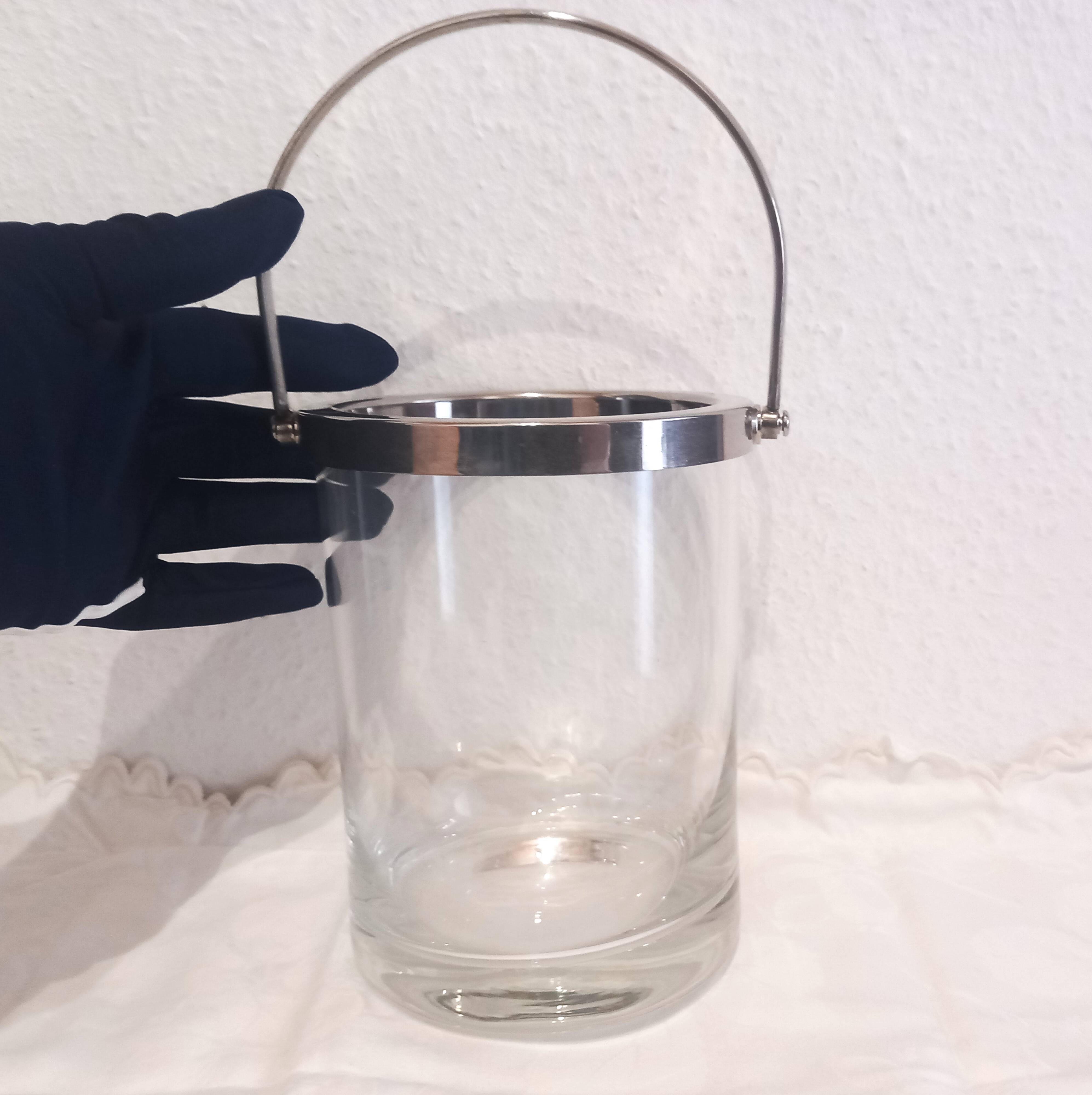 Glass and silver metal ice bucket