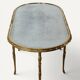 Maison Baguès coffee table in gilded bronze and aged mirror – 1950s