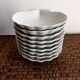 Set of 9 shell-shaped bowls