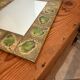 Vintage 1960s green and brown glazed ceramic mirror.