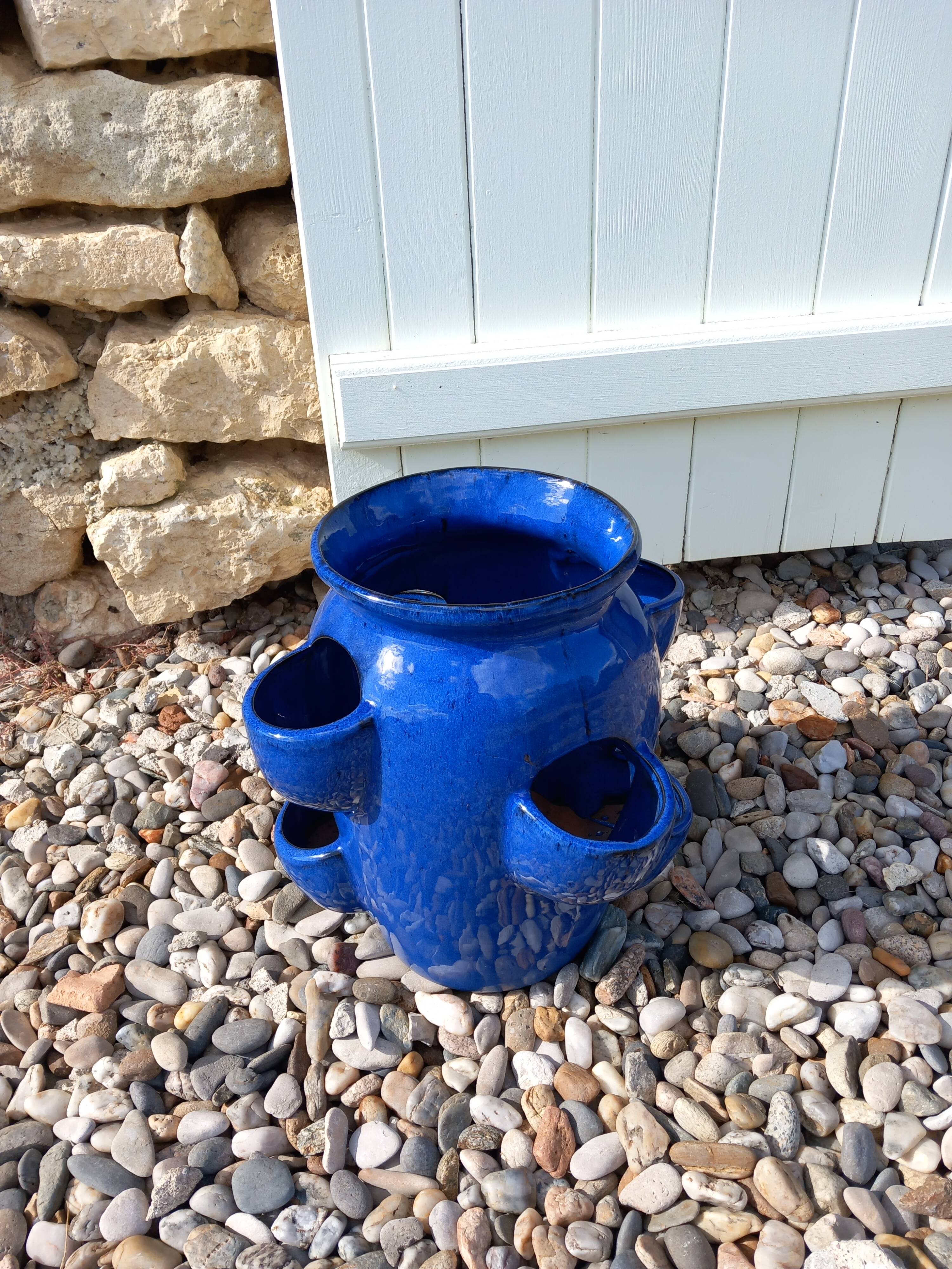 Blue glazed terracotta strawberry pot