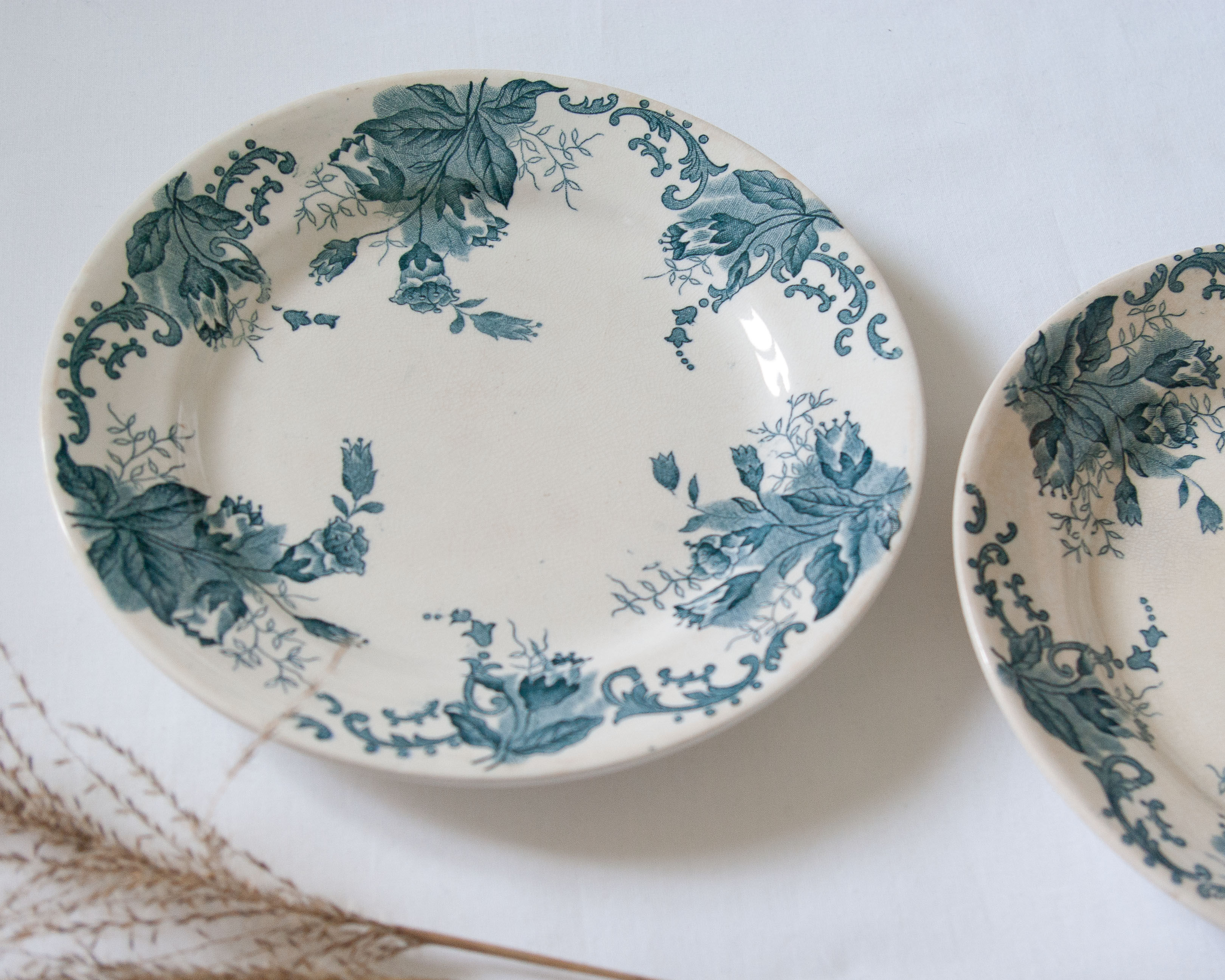 Pair of old flowered plates