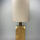 Cork and brass table lamp, bouclé shade. Leola Design Germany 1970s