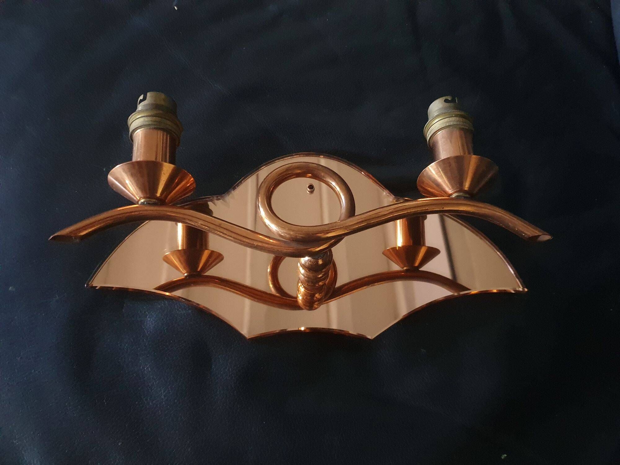 Copper wall lamp with 1940s Art Deco shades.
