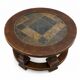 Round coffee table in stone and wood
