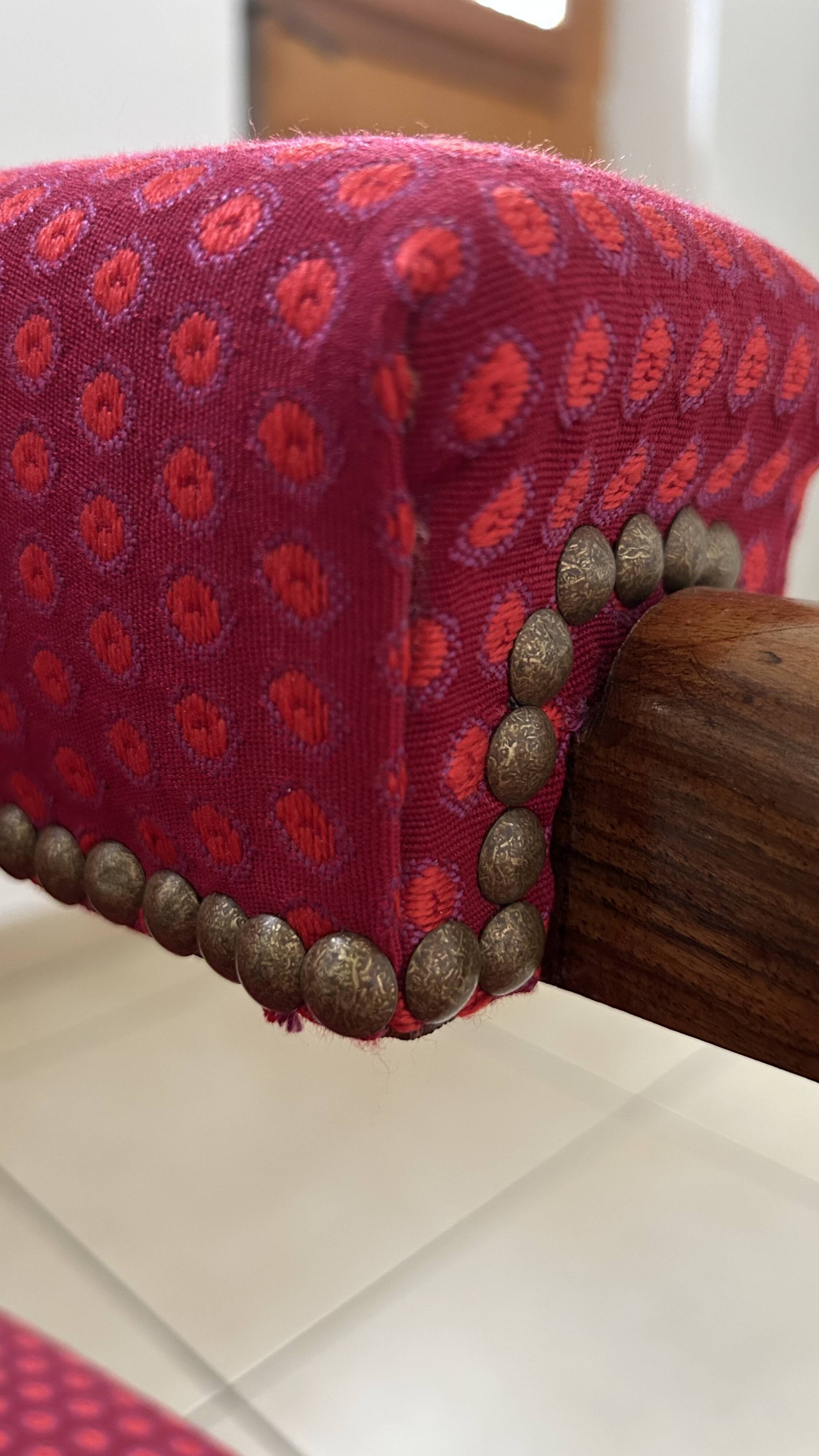 Antique Louis Philippe armchair in walnut and red fabric.