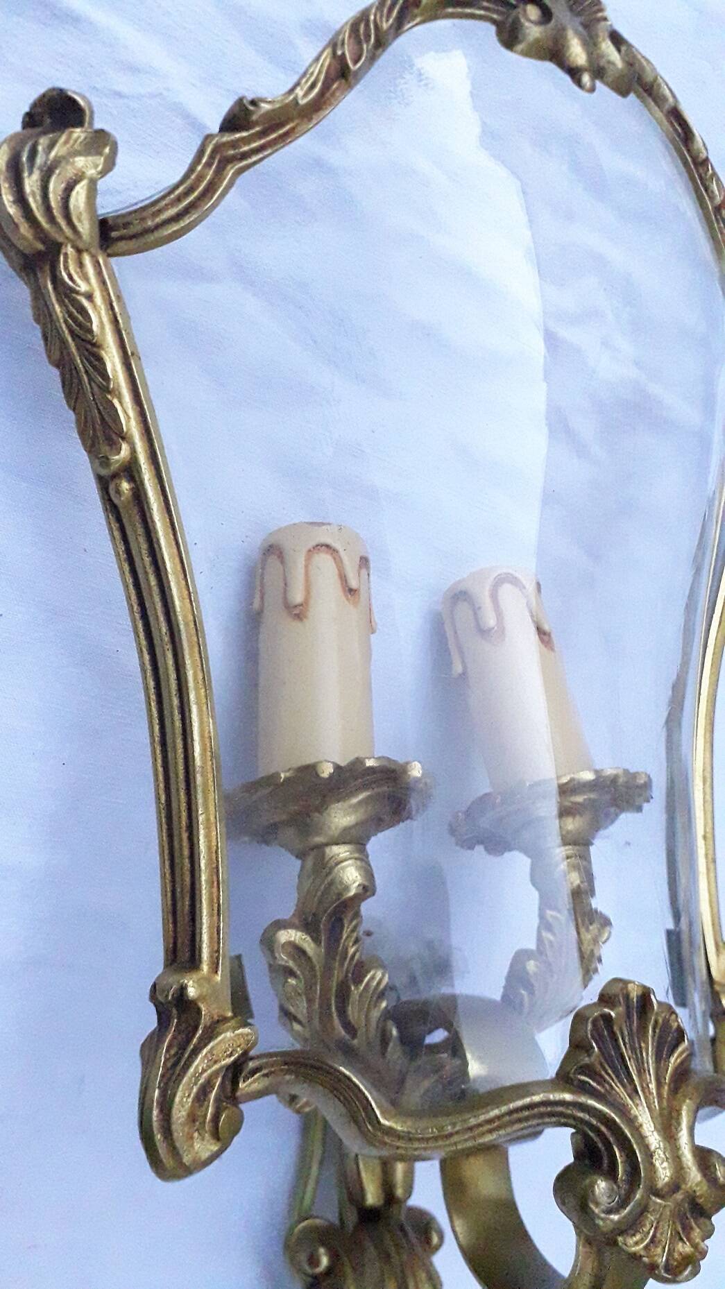 Pair of bronze and glass wall lights