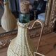 Old brass scoubidou decanter