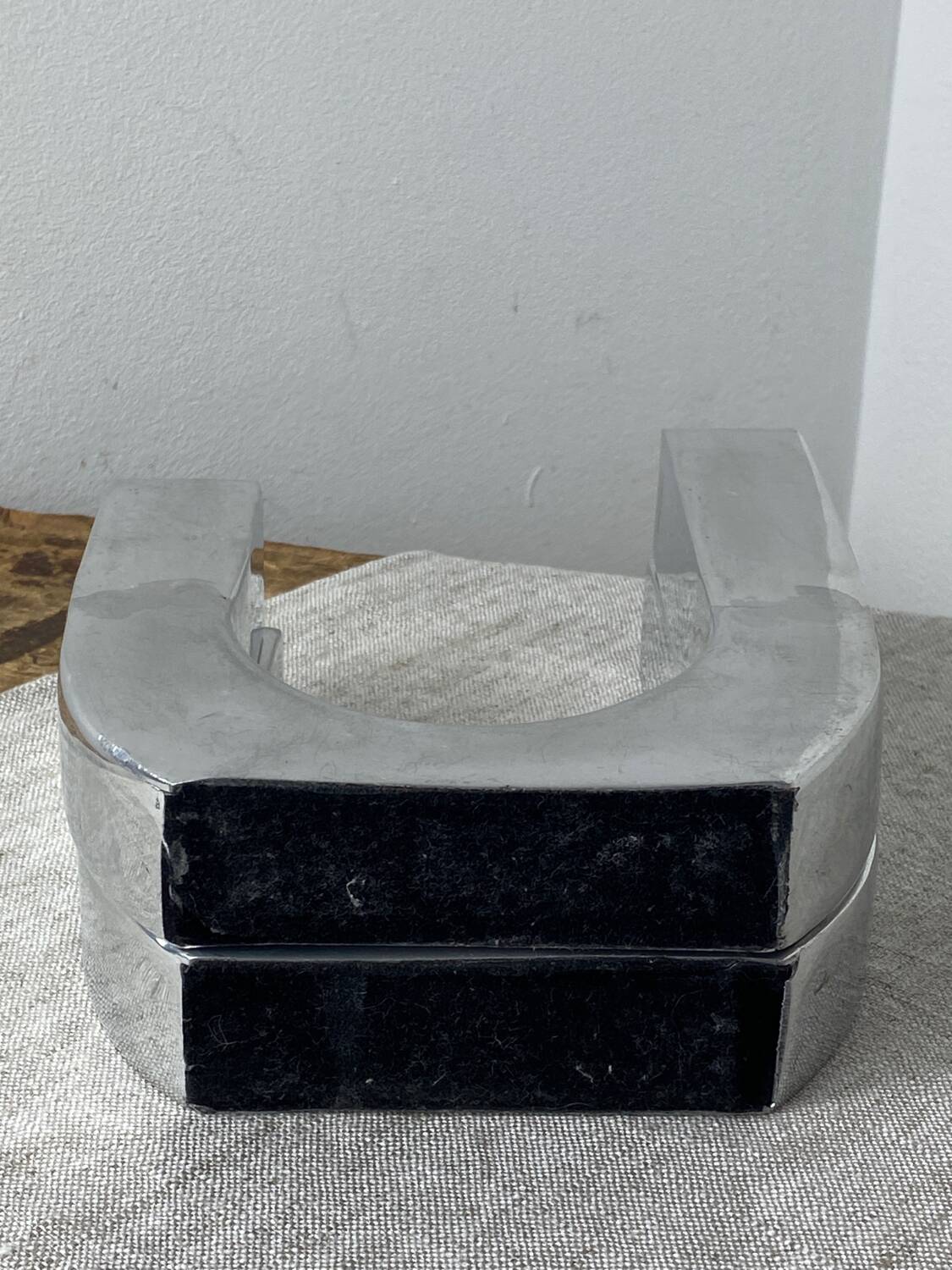 Designer candle holders in brushed aluminum