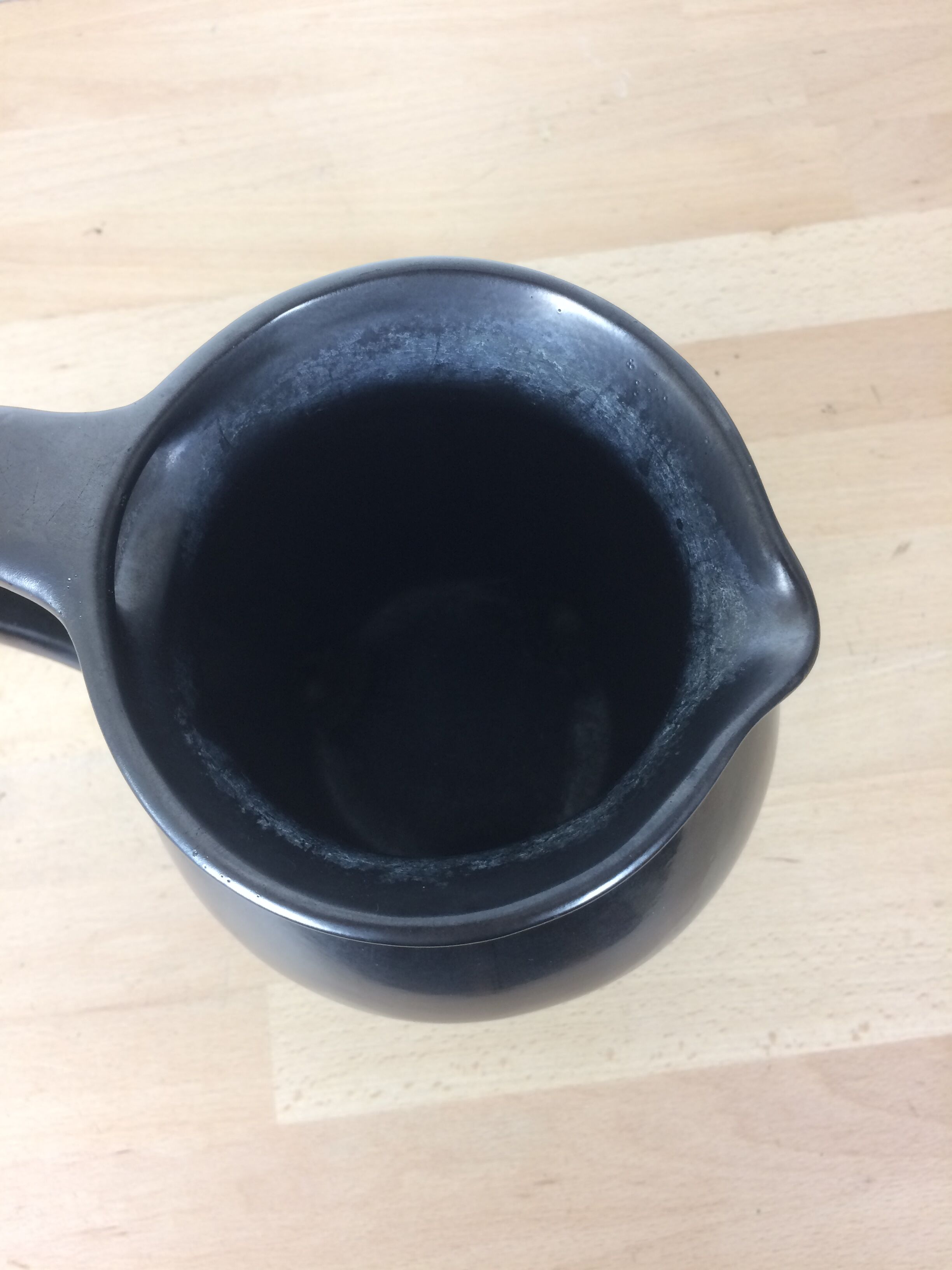 Black satin ceramic tripod pitcher 50s