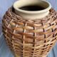 Vintage stoneware and rattan vase