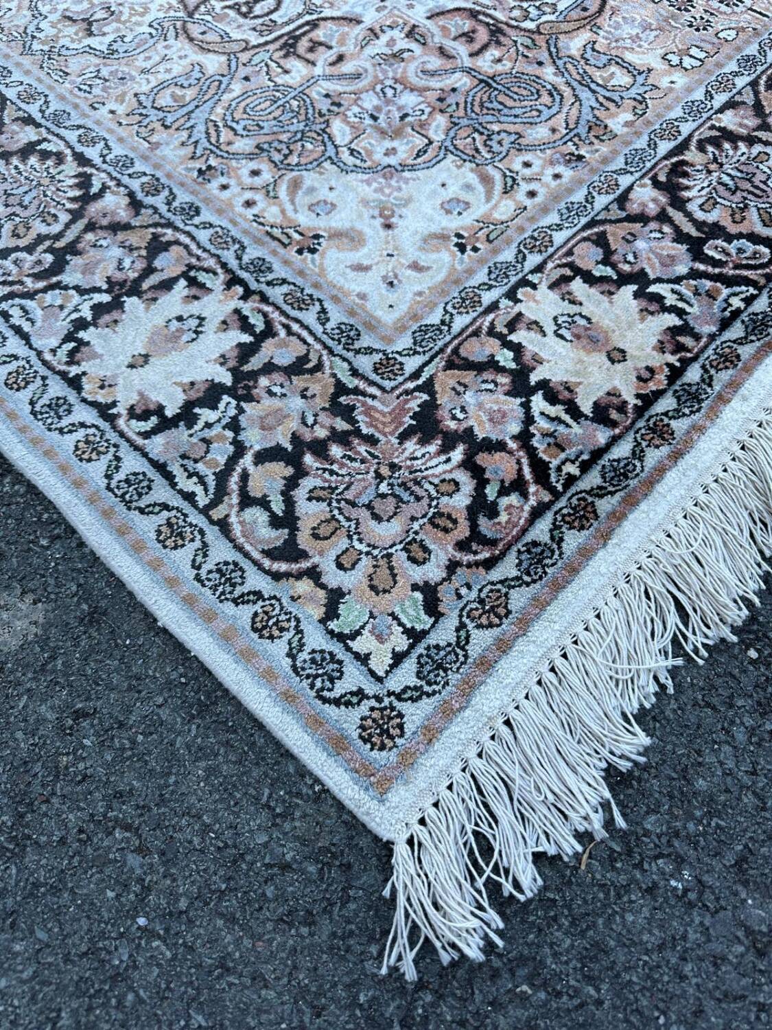 Hand-knotted Persian silk rug