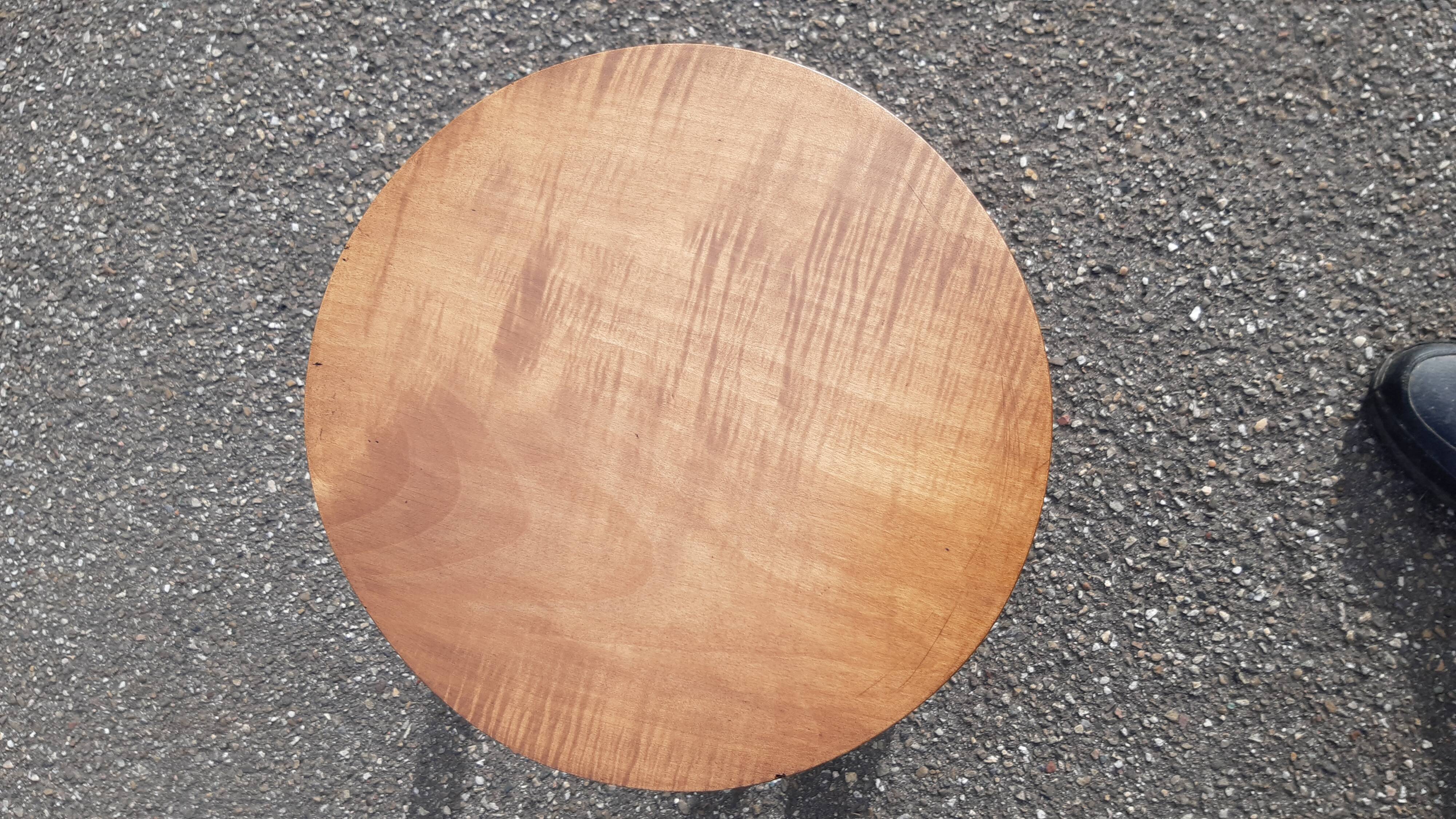 Wooden tripod stool with turned legs