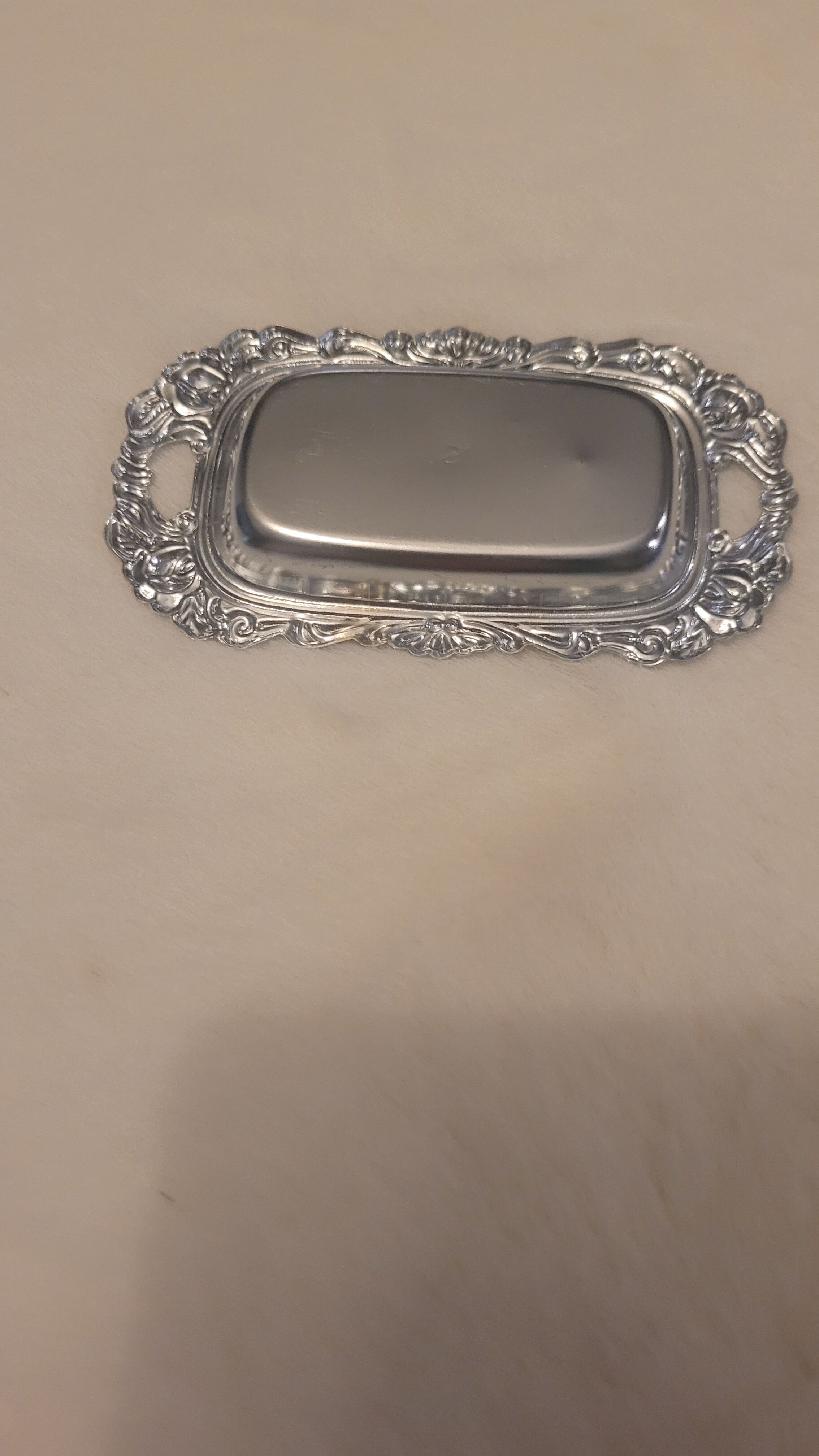 Salt and pepper and silver tray