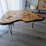Tripod coffee table in natural solid elm magnifying glass