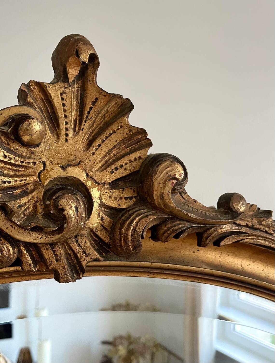 Antique oval gilt mirror.