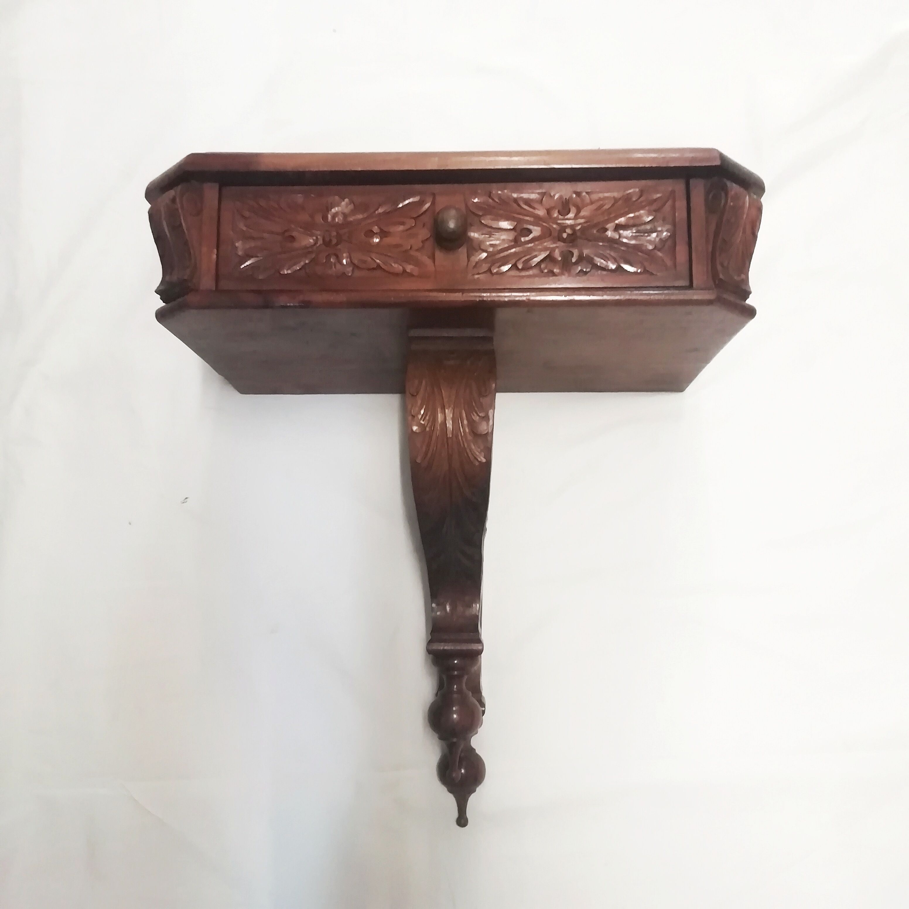 Carved wood side table. 1950s