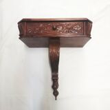 Carved wood side table. 1950s