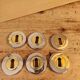 Rare vintage metal door lock fittings in gold and silver.