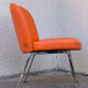 Chauffeuse vintage orange skaï et chrome 1970