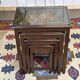 Set of 4 Chinese nesting tables in teak from the 1980s.