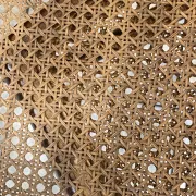 Pair of antique caned and wooden chairs from the 1900s.