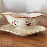 Large antique sauceboat in Longchamp earthenware.