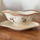 Large antique sauceboat in Longchamp earthenware.