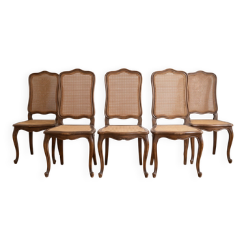 Set of 5 vintage caned chairs in classic style.