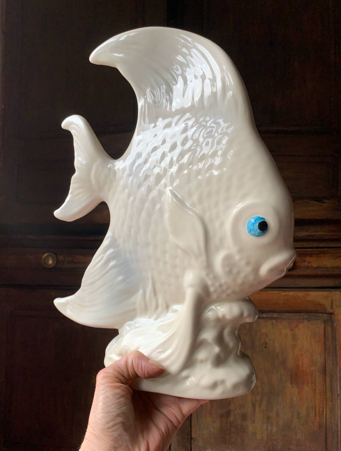 Large white ceramic fish to place.
