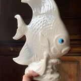 Large white ceramic fish to place.