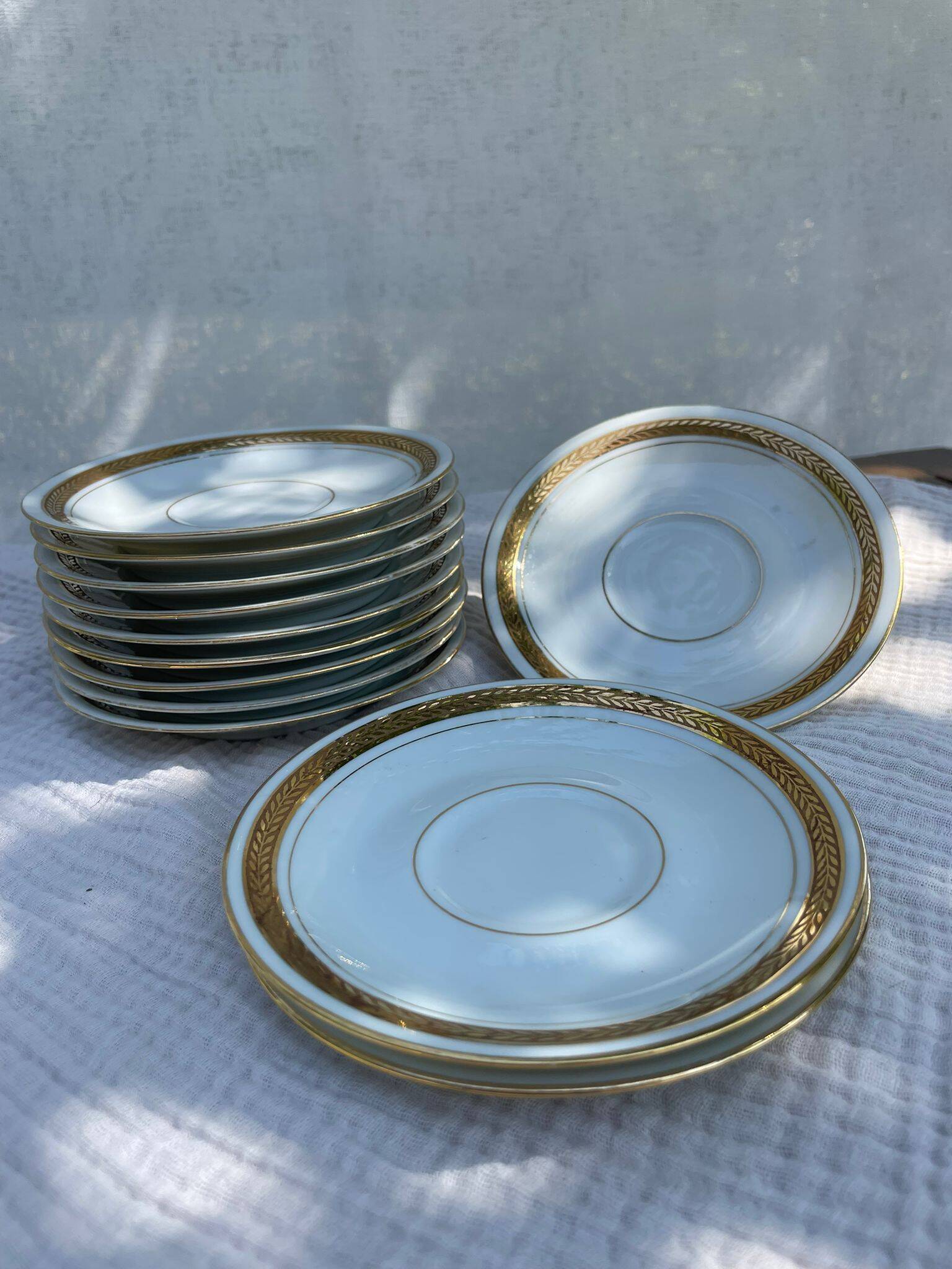 Porcelain set of small plates golden Limoges France
