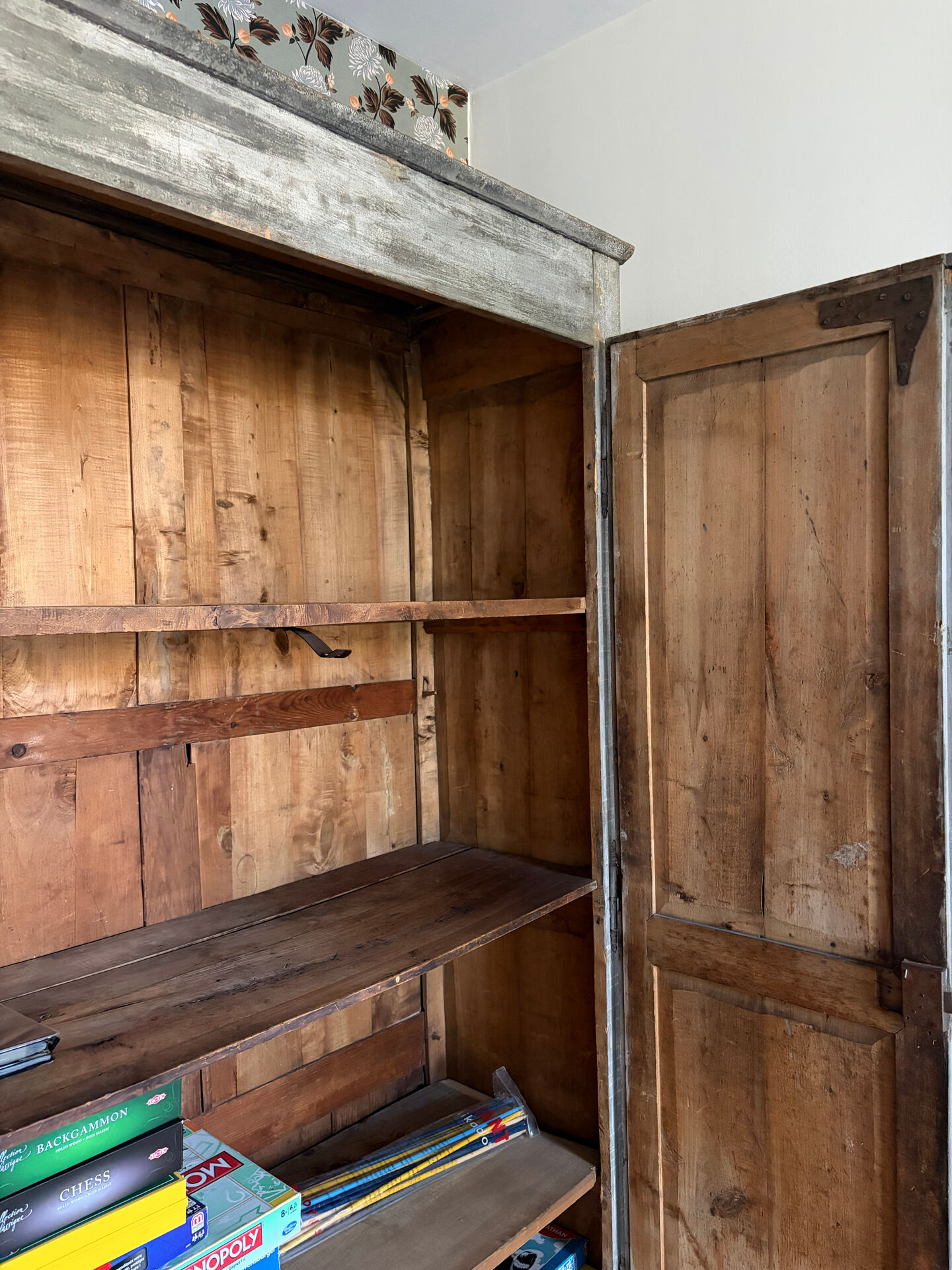 Antique Provençal wardrobe with a patina