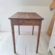 Old farmhouse side table in country style
