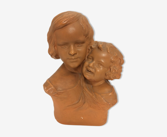 Buste en plâtre de petites filles art déco signé