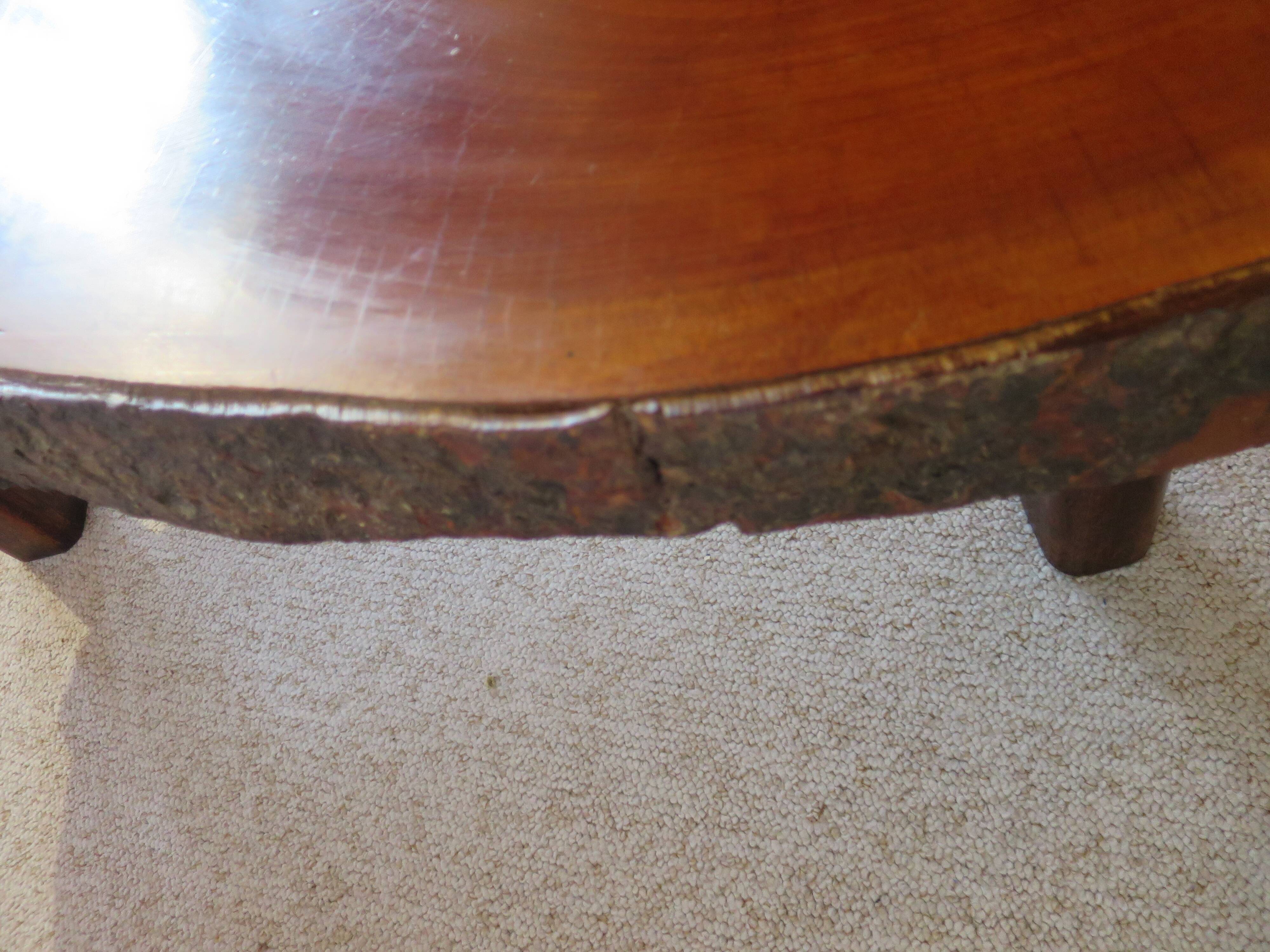 Tripod coffee table - solid okoumé wood - organic shape - brutalist style
