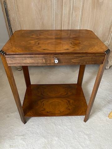 Walnut veneer pedestal table.