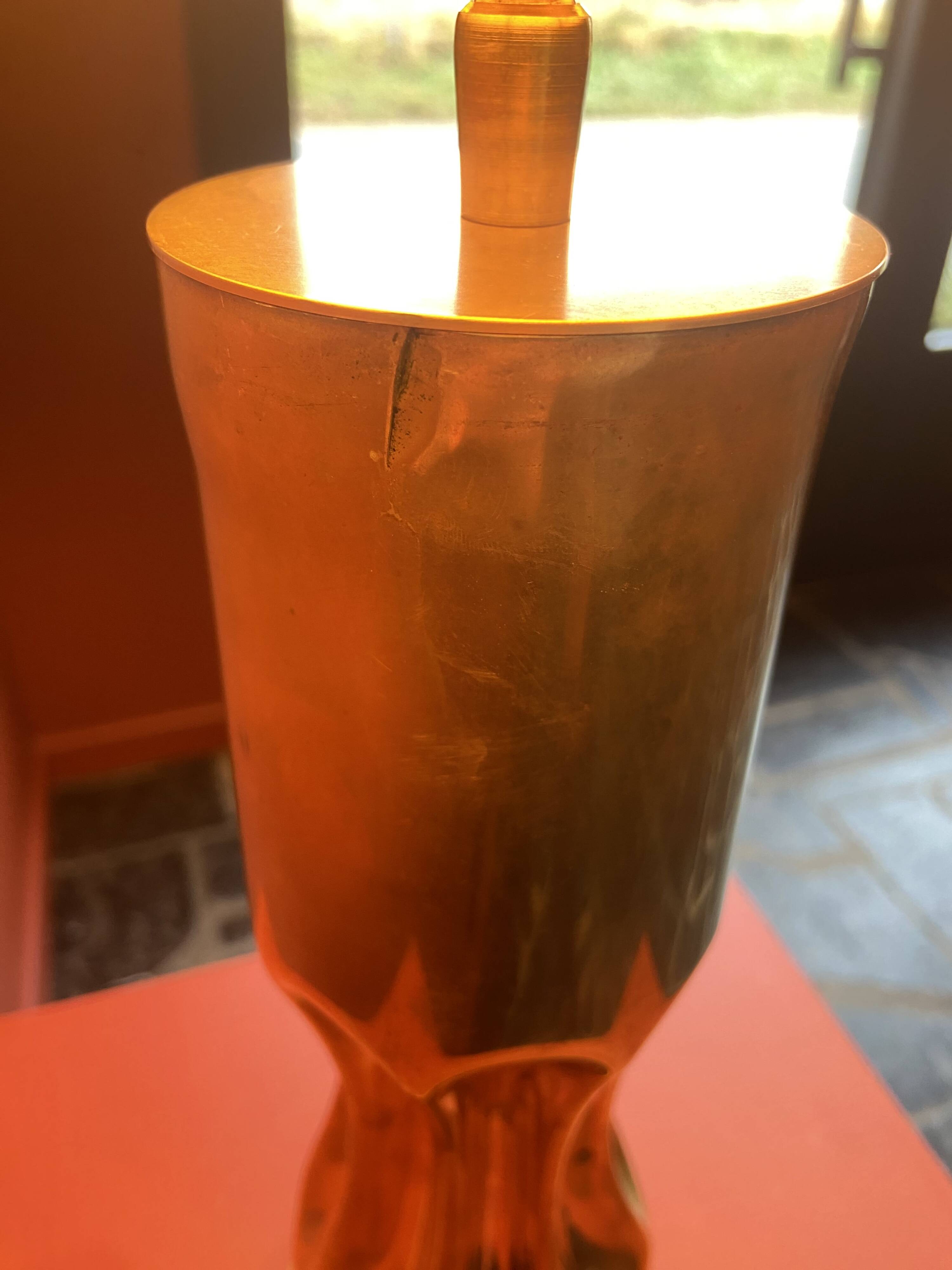 Brass shell socket lamp from the 1st WW, black pyramidal lampshade in Carlucci linen.