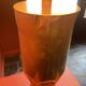 Brass shell socket lamp from the 1st WW, black pyramidal lampshade in Carlucci linen.
