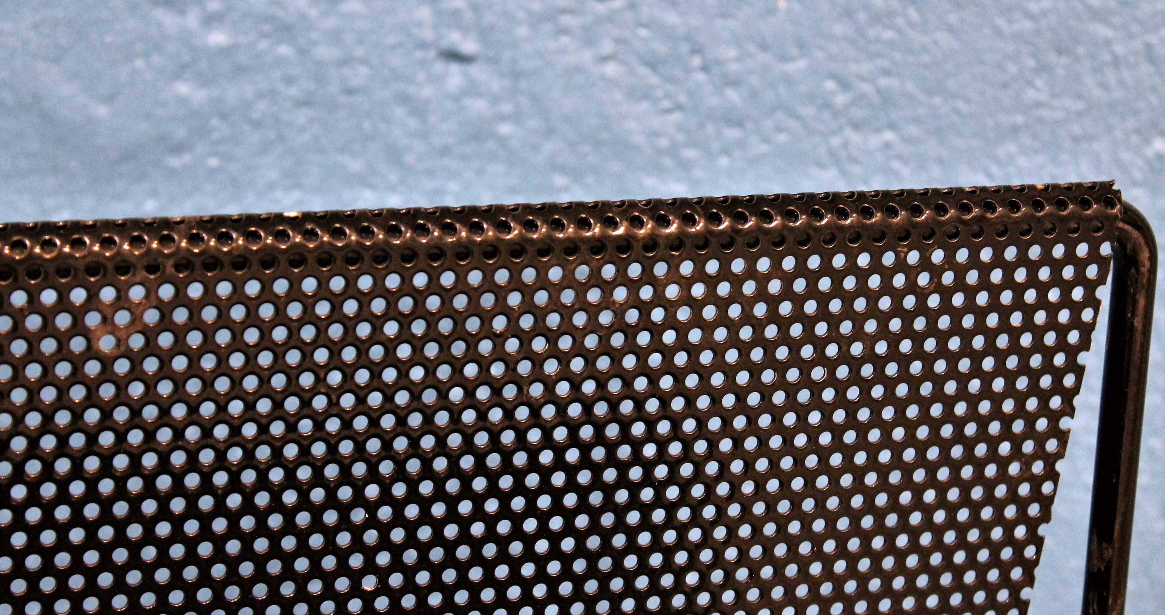 Perforated metal magazine rack Morgens 1980s