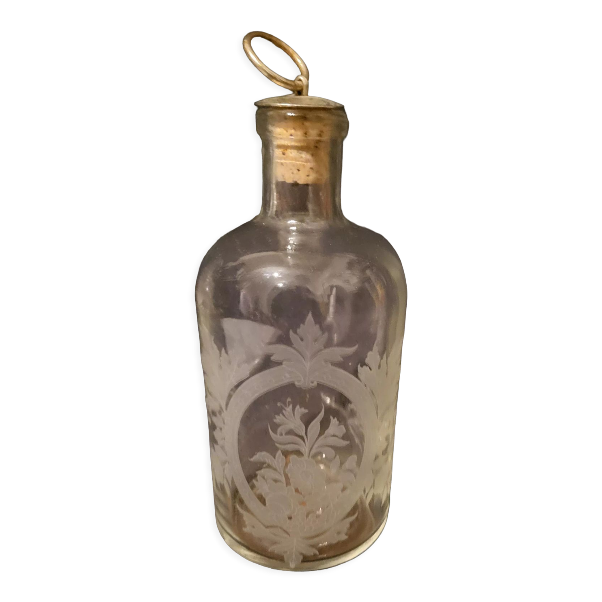 Engraved glass bottle
