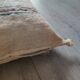 Off-white Berber cushion with wool pompom