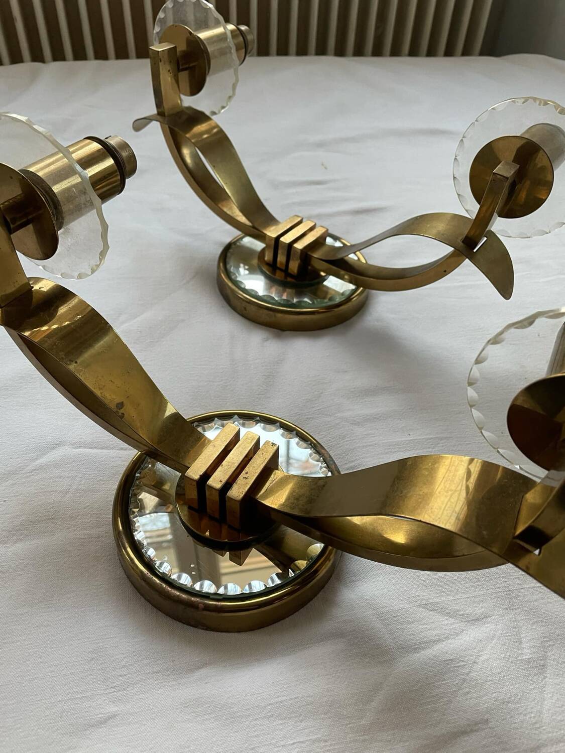 Vintage pair of art deco brass and mirrored glass wall lights France 1940