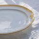 Very large oval dish with gold trim in Limoges porcelain by Peconnet.