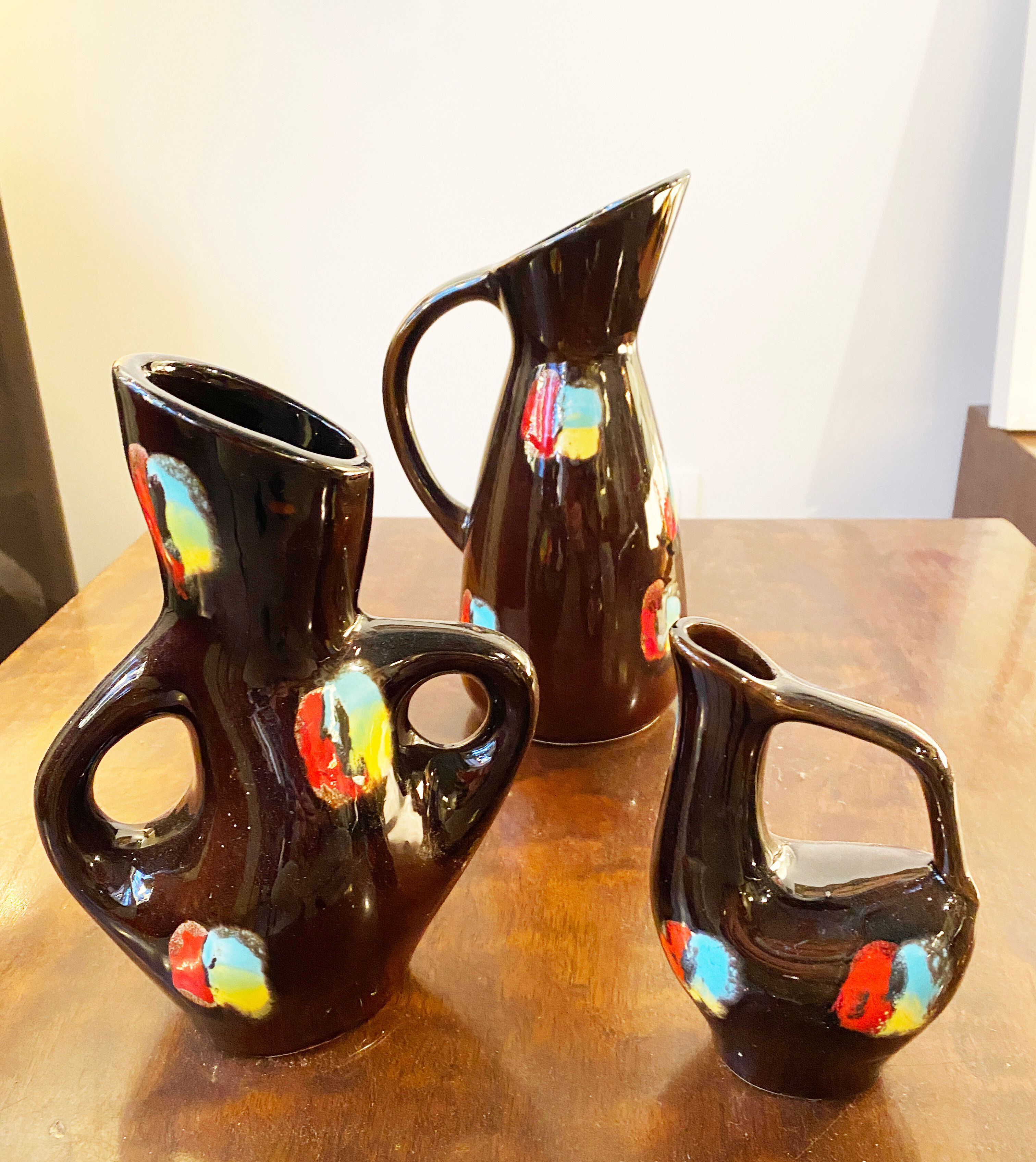 Set of three ceramic pitchers