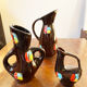 Set of three ceramic pitchers